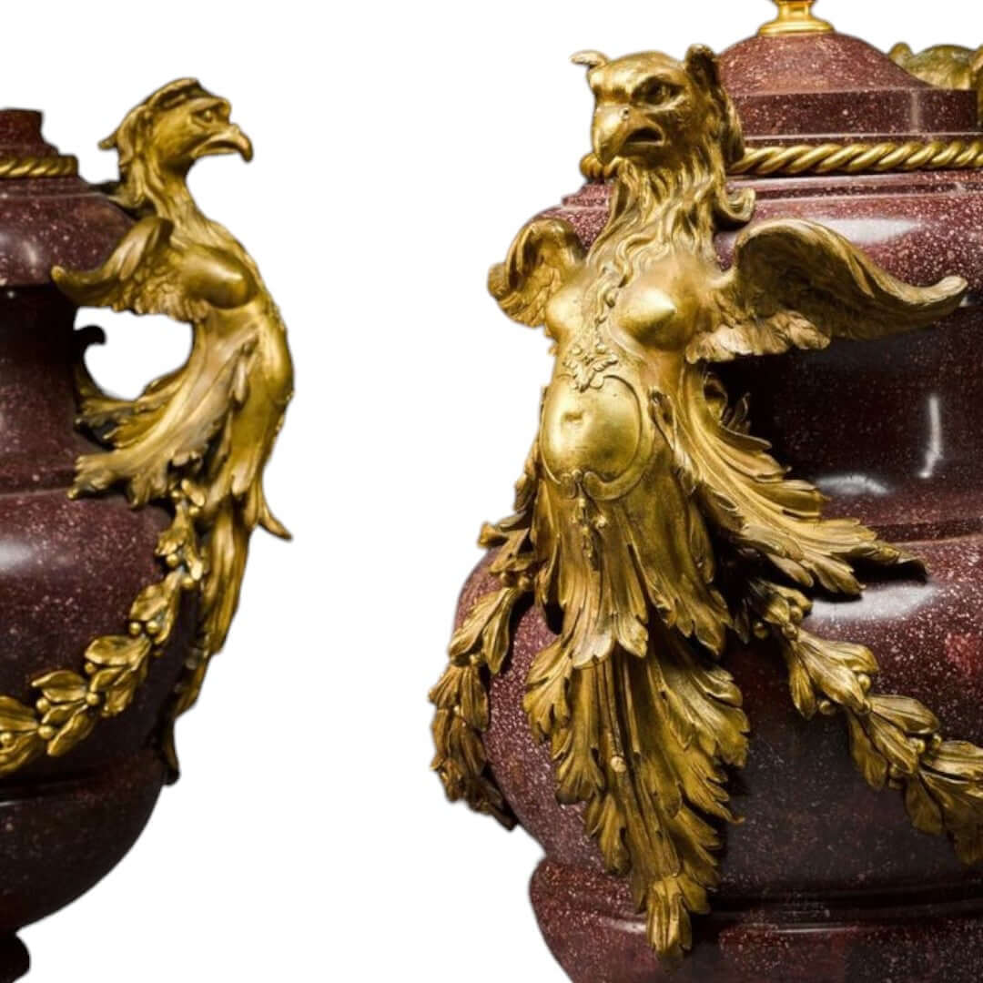 Exquisite decorative vases featuring ornate golden eagle and cherub motifs, perfect for enhancing any space.