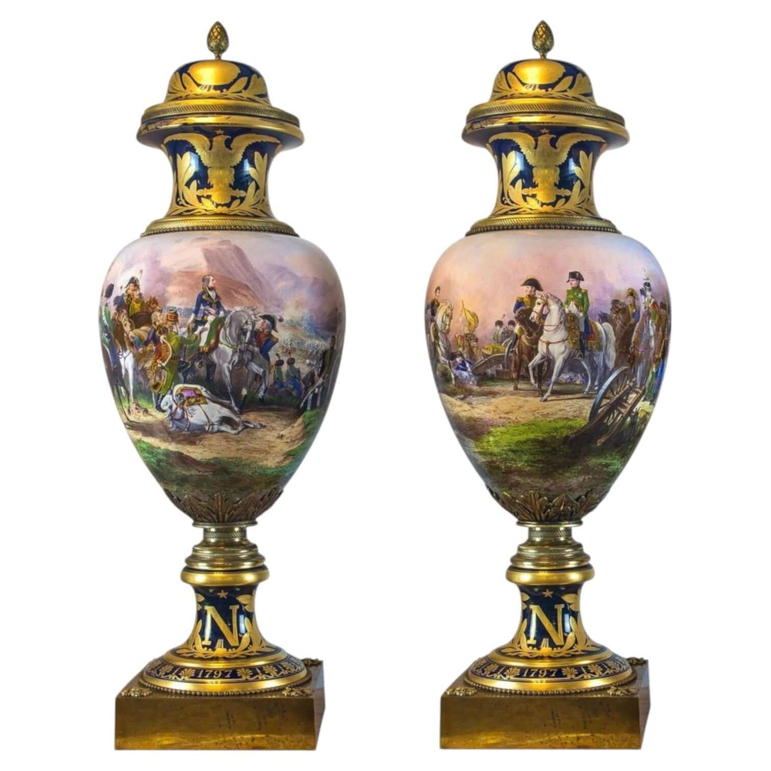 Exquisite ceramic vases featuring detailed historical scenes and ornate gold accents, perfect for any collection.