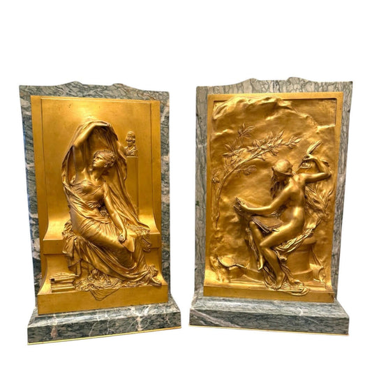 A pair of French gilt bronze relief plaques titled - Antiquité Gallery