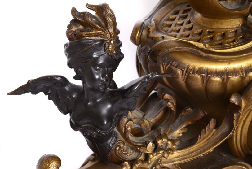 A FRENCH ORMOLU AND PATINATED-BRONZE ‘CHARIOT’ MANTEL CLOCK - Antiquité Gallery