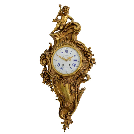 A Rococo style gilt bronze cartel clock, marked 'Ste. des Bronzes, Bruxelles - Antiquité Gallery