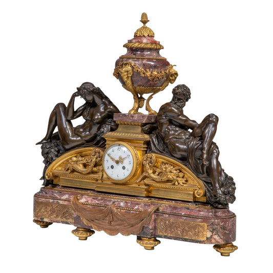 An imposing Napoleon III marble, gilt and patinated bronze mantel clock, by Ernest Levi - Antiquité Gallery