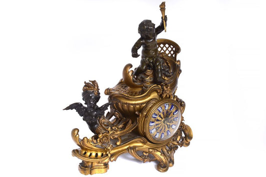 A FRENCH ORMOLU AND PATINATED-BRONZE ‘CHARIOT’ MANTEL CLOCK - Antiquité Gallery