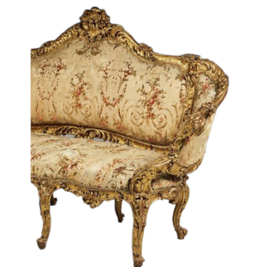 Molded, carved, and gilded wood sofa with rich decoration on all sides - Antiquité Gallery